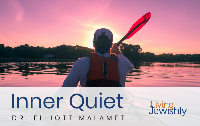 Inner Quiet Featured Image - A man paddles a kayak - silhouette from behind, purple sunset ahead of him